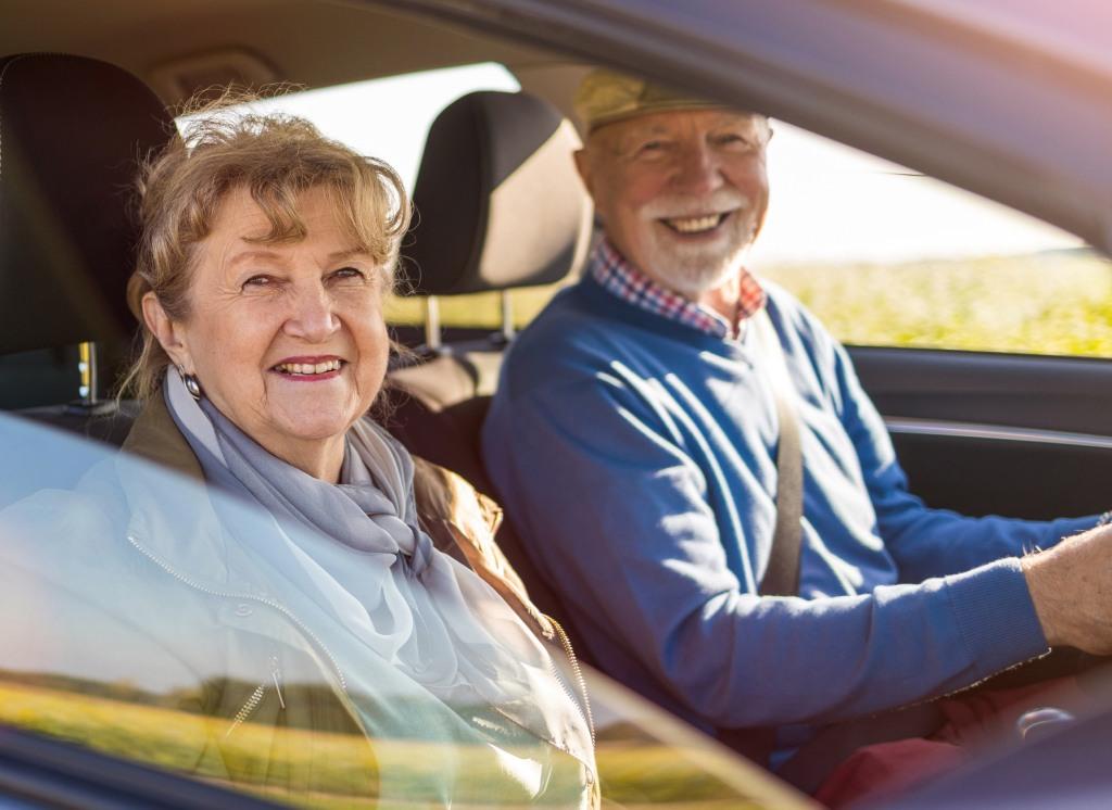 Gentleman driving an older lady to her appointment.